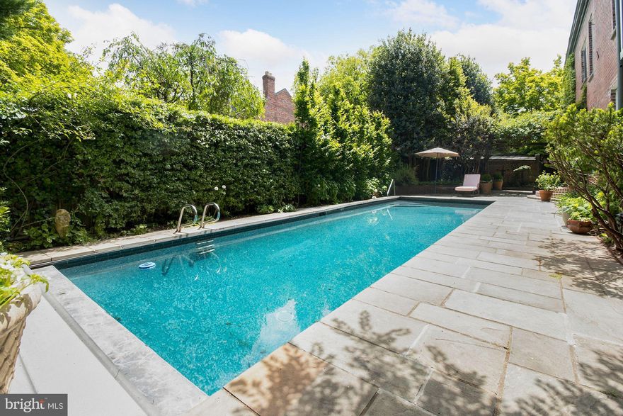 Ideally situated in private enclave in Georgetown's sought-after East Village, this 6BD/5.5BA townhouse sits on nearly 6,000sq/ft lot, making for a private residence, not to mention its own Private Pool and Patio. Fully updated in 2020, this home features high-end finishes, hardwood floors, recessed lighting, and upgrades throughout including full Waterworks Bathrooms. Main Level features an open floor plan that boasts light-filled, spacious living spaces which seamlessly integrate into the sprawling patio through several sets of French glass doors. Level also includes updated gourmet Kitchen with Viking appliances and marble countertops. Other features include gracious Owner Suite flooded with natural light, includes Sun Room with skylight and large surrounding windows, 2 closets, and en-suite Full Bath with Waterworks fixtures, soaking tub, dual vanity with marble countertop, and steam shower with marble tile. Situated in private enclave and sited on nearly 6,000sq/ft. Complete with stunning Side and Rear Patios made private by surrounding foliage. Private Pool and 2-car Garage.