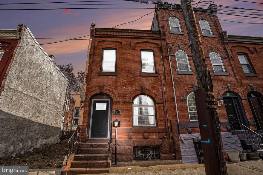 Nestled in Philadelphia's vibrant Brewerytown neighborhood, 1331 N 29th Street offers an updated townhouse that seamlessly blends modern amenities with classic charm. This spacious residence features 3 bedrooms and 1.5 bathrooms across 1,444 sq ft of living space, providing ample room for comfortable living.
The kitchen boasts granite countertops, stainless steel appliances, tile backsplash, and a convenient breakfast bar, making it ideal for both everyday meals and entertaining. The open-concept living and dining areas feature hardwood floors and an exposed brick accent wall, creating a warm and welcoming atmosphere. A first-floor powder room and laundry room add to the home's practicality.
Situated on a wide, two-way street with ample parking, this home offers easy access to public transportation and is just a short walk from Girard Avenue's shops and eateries. With recent updates including a brand new spa-style shower, freshly painted interior, new front and rear doors, and newer HVAC and water heater, 1331 N 29th Street presents an exceptional opportunity to experience modern living in one of Philadelphia's most dynamic neighborhoods.