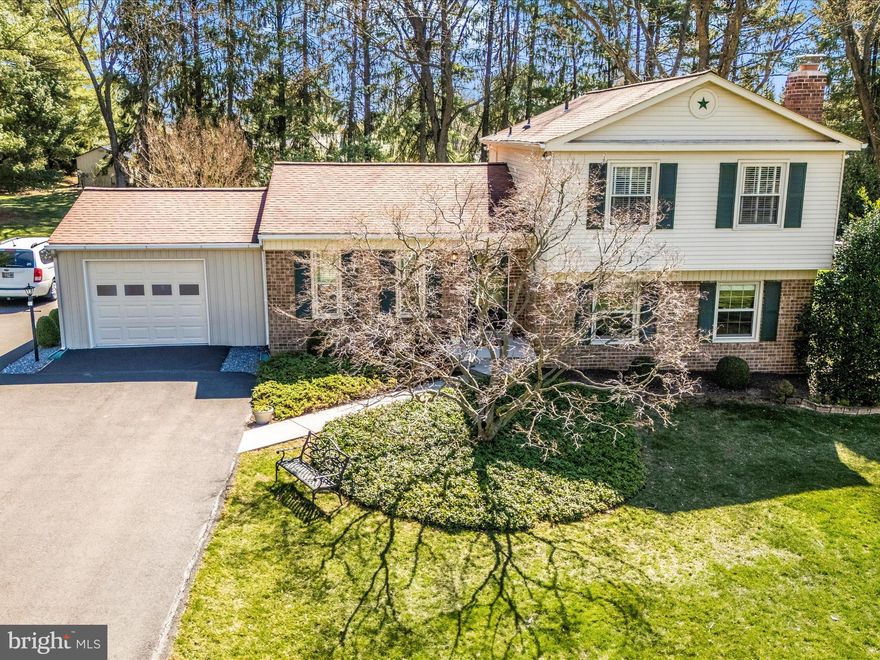 Offer deadline Monday March 31, 12 noon.  

Get a piece of Eldersburg for a great price! 

This GEM is pristine and situated on a lovely tree studded landscaped level lot in one of the most popular areas of Eldersburg.    The attractive exterior offers an extra  wide asphalt driveway  with parking (including 50 AMP hookup and water) for an RV/trailer/camper. 

You will love the opportunity for flexibility in how you utilize the finished space in the home as there is so much FLEXIBILITY! 

Open floor plan on the bright main level.  Interior access to the oversized one car garage is actually fully finished space that has heat and A/C.  The current seller added the garage door and kept a collectible car in the garage but it can EASILY be used AS IS for additional conditioned space.   Mid/lower level Family Room with beautiful full wall  brick fireplace (natural gas and could convert back to wood burning).  

There are 3 bedrooms and 2 full bathrooms upstairs and a fourth bedroom and half bath on the mid/lower level.  This bedroom could be a perfect home office as it also has exterior access with a side entry door.   Mid level laundry ROOM with built in cabinetry.  

Lower level is unfinished  and offers ample storage space.  

Front and rear sidewalks leading to the front porch and the deck (including awning)  that overlooks the serene rear yard with storage shed.  

New neutral paint and carpet. 
Roof 2016
Water heater 2022
Septic pumped and evaluated 2024
Replacement windows
Systems regularly maintained

VERY well maintained. Great curb appeal. Stellar school system.  All that Eldersburg has to offer within minutes.