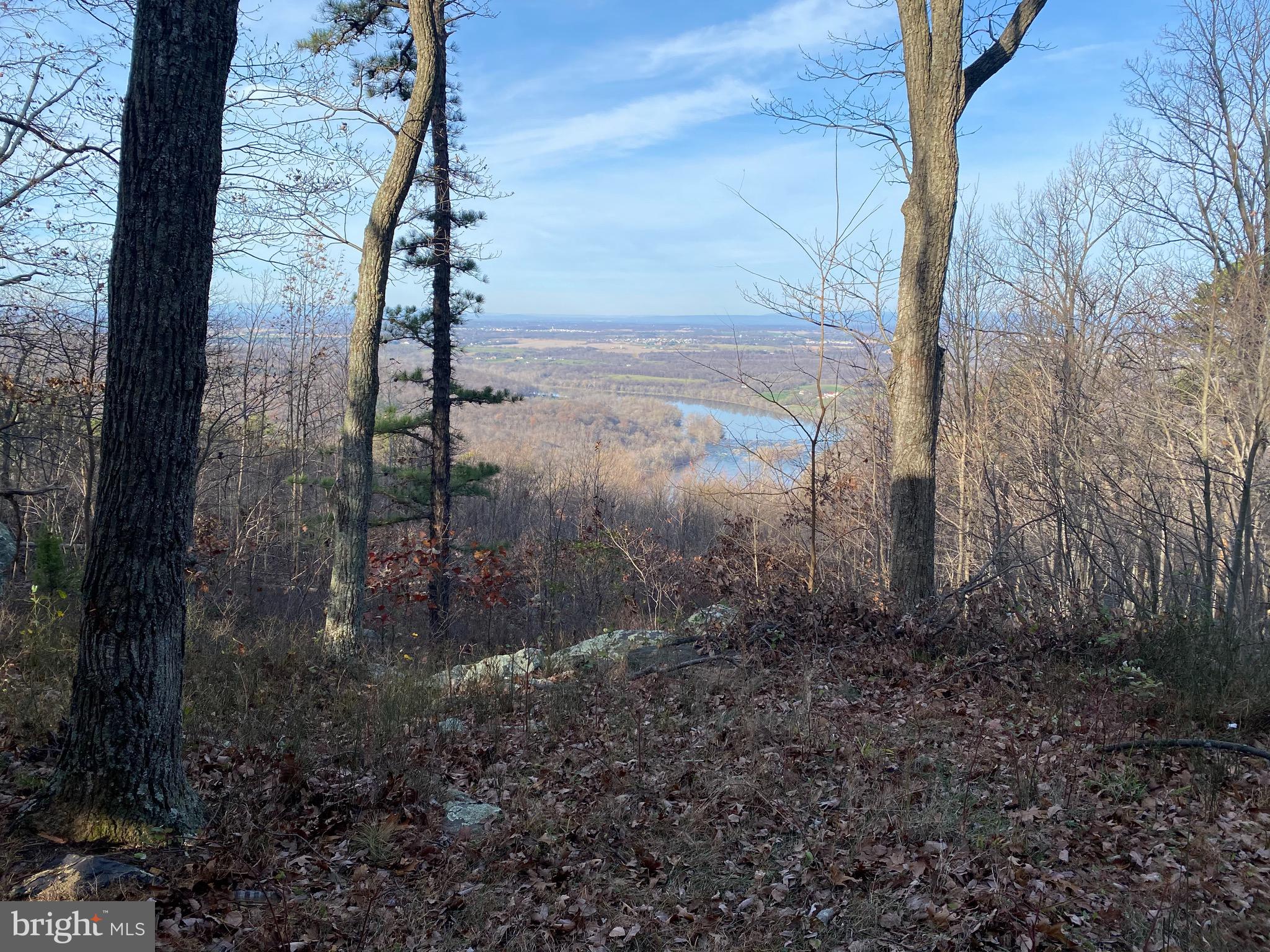 Mountain Top Vista ! Cozy 2 Bedroom cabin with Beautiful scenic overlook of the Shenandoah River. This extremely private property is every nature lovers dream. Have your morning coffee on the screened in back porch looking at a priceless view, and then walk less than a hundred yards to get on the Appalachian Trail. This property is on a gated private drive and sits at the crest of the Blue Ridge Mountain just off the VA/WV line providing an easy commute to NVA. There is no road maintenance so 4WD is recommended. You will be surrounded by wildlife and nature. This is the ultimate get away or everyday escape!