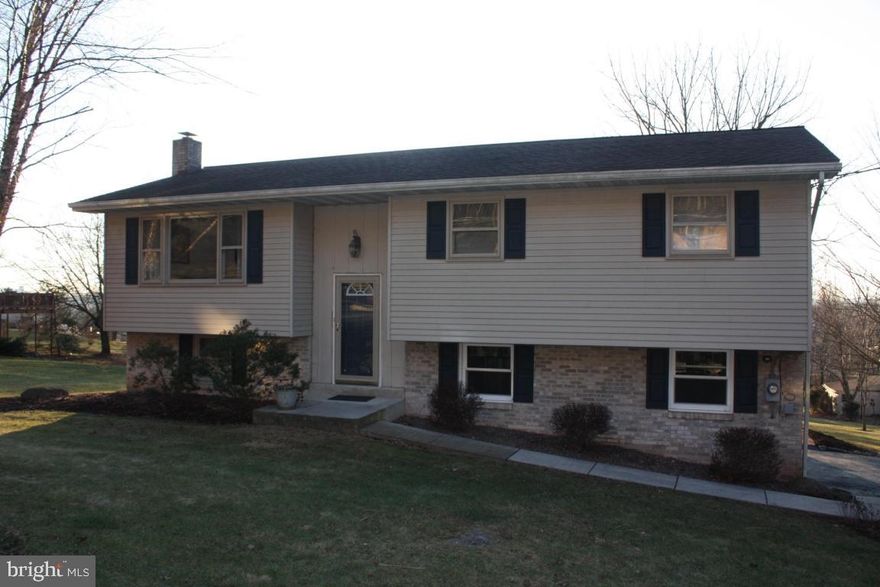 VERY NICE & WELL MAINTAINED BILEVEL on NEARLY 1 ACRE lot-3 bedrooms, 2 full baths, lower level family room w/brick hearth & wood stove, heat pump & central air-2 car garage plus detached 1 car garage and workshop w/electric and stone driveway-GREAT OPPORTUNITY to purchase economical home w/beautiful back yard