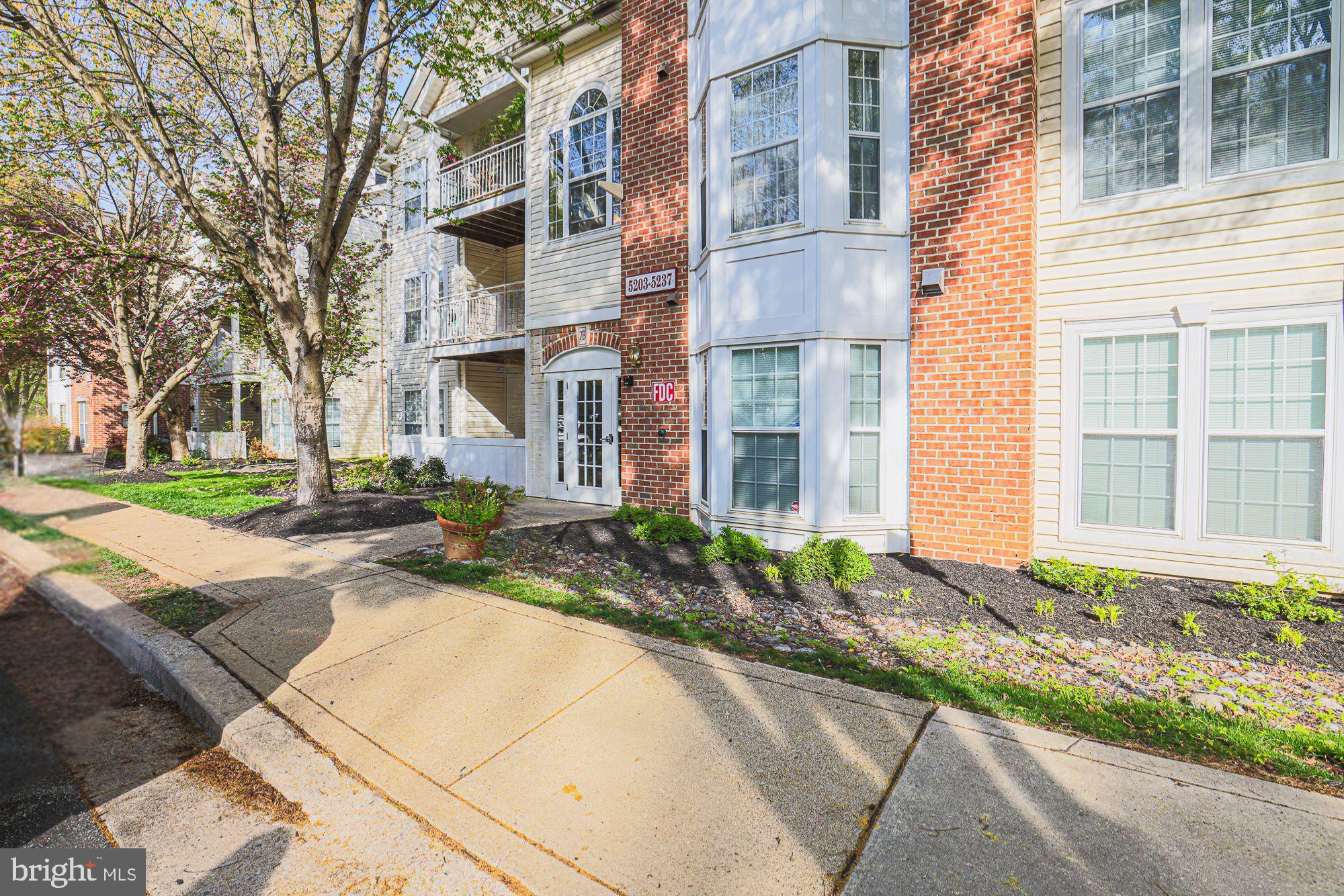 Welcome to this beautiful 2-bedroom condo in Owings Mills! Step inside to an inviting open-concept layout where the family room, dining area, and kitchen flow seamlessly centered around a charming gas fireplace that creates a warm and cozy focal point. Enjoy sunny days and fresh air on your private balcony just off the living area. This home also features a new in-unit washer and dryer for added convenience, along with a water heater replaced in 2020, new garbage disposal, and thoughtful updates throughout the years. Located in a vibrant community close to shopping, dining, and recreational options, you’ll love the perfect balance of suburban tranquility and urban accessibility. Don't miss this move-in-ready gem! **$2,500 credit being offered by the seller to spend on your new carpet, appliance, paint, closing costs or anything you are looking save some money on!**