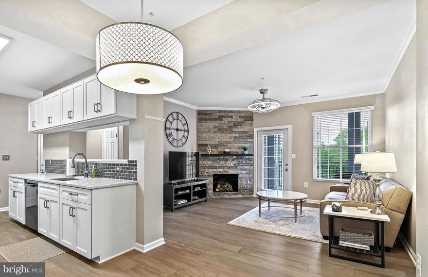 A stunning, meticulously maintained condominium with modern upgrades. This second-floor condo features two generously sized bedrooms, two full baths, and a spacious covered balcony, providing the perfect spot for relaxation. The kitchen has been tastefully updated with white cabinets, quartz countertops and gas cooking. Additionally, it includes an in-house washer and dryer for your convenience. This condo complex offers a wide range of amenities, including a swimming pool, party room, tod lot, walking trails, clubhouse, basketball courts, and much more. Situated just minutes away from a variety of restaurants, shopping centers, and the Dulles International Airport. The condo comes with two reserved parking spaces, and ample parking spaces for guests.