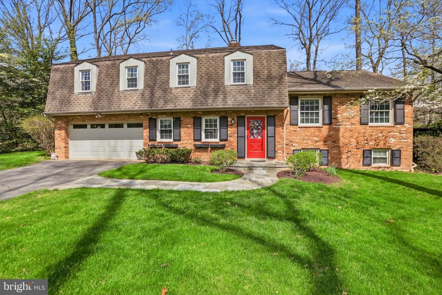***OPEN HOUSE - Sunday, May 10th 2026, 12-2pm***Welcome Home to your dream life! Seller is an Agent. Experience the ultimate luxury living in this exquisitely maintained and lavishly updated 4 sides brick single-family haven nestled in the heart of desirable Reston. Freshly Painted in a neutral tone and brand new carpeting installed in the den! With over 3,000 Sqft. of radiant living space, this stunning property boasts 4 spacious bedrooms, 2 full and 1 half bath, all masterfully updated to perfection. Indulge in the warmth of heated bathroom floors, a spa-like getaway with a glass enclosed shower, separate soaking tub, the elegance of gleaming hardwood floors and ceramic tile, custom built-ins and breathtaking views from the expansive kitchen overlooking the serene, mature and meticulously landscaped, half acre lot. Unwind in the all-season sunroom, basking in the natural light that pours in through skylights that fill the home. The cozy den features a warm gas fireplace. An Entertainer’s Dream Kitchen with ample countertops, custom cabinetry and additional built-ins, this space leads to a trex deck and patio below, surrounded by fresh blooming azaleas, to enjoy your morning coffee or tea in complete privacy. Thoughtful upgrades throughout include dual vanities in both full bathrooms, heated floors, granite countertops, a bay window in the kitchen, spanning the width of the home, all to savor the expansive backyard view! 
A surprise 4th level expansion is convenient for flex space, office, another den, home gym, au-pair or in-law suite. Arriving home to your 2-car garage is so convenient as well, after entering the long driveway, with ample space to park up to 8 cars! The artistic flagstone patio leads you to your front door. Situated on a peaceful cul-de-sac, just minutes from Reston Town Center, this haven offers the ultimate retreat within minutes of all that Reston has to offer!