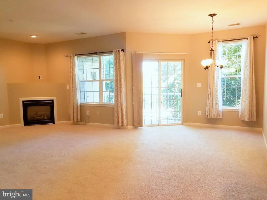 Price reduced. Charming, modern sun filled 3 BR & 2 full BA condo w/ one-car garage & one assigned parking space, Largest model 1580 sf, Open floor plan, Galley kitchen w/ BRAND NEW stainless steel appliances & breakfast nook, BRAND NEW carpet, FRESH paint, Spacious living room w/ fireplace, Master Bath w/ separate shower & tub, Balcony, Close to I-270, shopping centers. Move in ready.