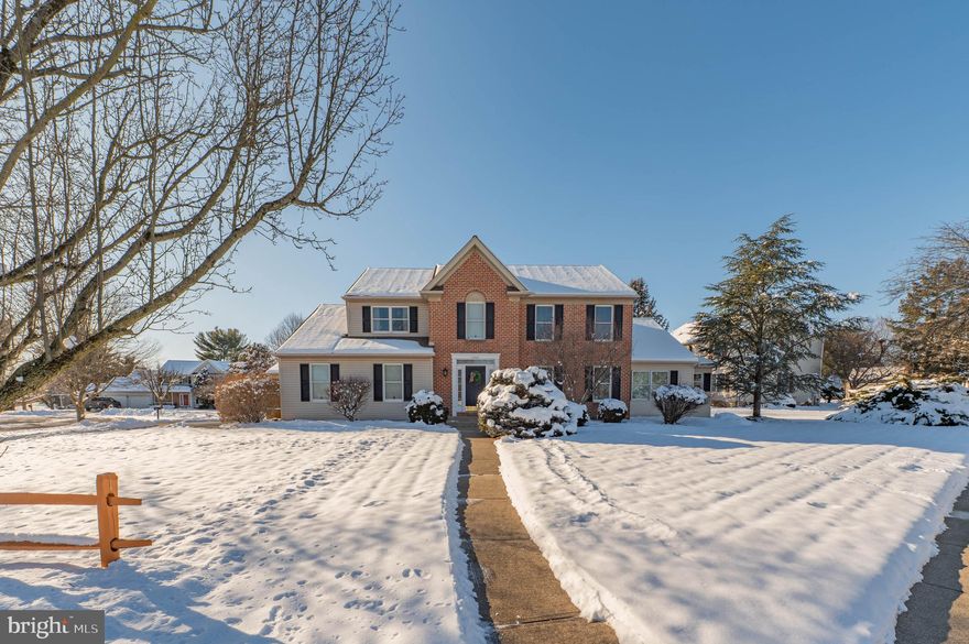 This beautifully appointed East Penn home comes complete with an expansive in-law suite and resort-like backyard. Exceptionally well cared for and spacious this five bedroom, three and a half bath home offers remarkable flexibility. The first floor offers a well-designed kitchen open to the dining room and is completed by a cozy gas fireplace. The large family room provides daily living and entertaining functions with a bar and wall of windows overlooking the backyard. A spacious, first-floor suite with its own entrance, kitchen, living area, office, bedroom, and bath provides accommodations for extended family, guests, or a fabulous first-floor primary suite. Upstairs there is a second primary suite with a sitting area, walk-in closet, and bathroom. The second floor is complemented by three additional bedrooms, a full bath, and the option for a second laundry room. The lower level has another family room, private office, and laundry along with an abundance of storage and potential for additional finished living areas. The property is highlighted by an outdoor entertaining area featuring multiple TVs, a dedicated grilling space, and an in-ground pool with sun shelf and both heating and cooling ability. This wonderful home is located directly across from a park and with proximity to local shopping, restaurants, and roadways.