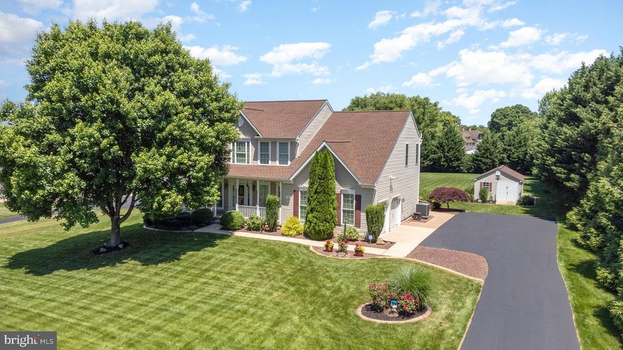 Welcome to beautiful Susquehanna Hills.  Situated in  the Port Deposit foothills near the Susquehanna river in Western Cecil County. This well cared for home shows pride in ownership at every turn.  Updated architectural roof (2020) with 50 year transferable warranty. Updated gutters 2020. Shed roof replaced 2019. A long tree lined driveway way greets you.  Side entry painted 2 car garage with updated & insulated garage doors. Landscaped walkway leads to a classic covered front porch with updated vinyl railings. Inside you enter a 2 story foyer with hard wood floors. Traditional floor plan with sitting room, formal dining, living room and large island kitchen and breakfast area with hard woods, granite counters and stainless steel appliances. Main level den, butler station, laundry room and updated half bath (2021). Upstairs has an extra wide landing,  Freshly painted primary bedroom with cathedral ceiling and double closets. Primary bath with double vanity, jet tub and separate shower. 3 additional bedrooms and 2nd full bath. Rear has double doors leading to an awesome paver patio with with knee wall perimeter. Large front and back yards, Fenced vegetable gardens and large workshop shed with dedicated electric service. Rear access finished basement with a custom wet bar and home theater. Large storage area (23x13) with custom shelving.  Enjoy the relaxing and private rural life in a distinguished neighborhood and still be close to schools, shopping, APG, I-95, Amtrak, MARC trains etc. Don't miss this great home!