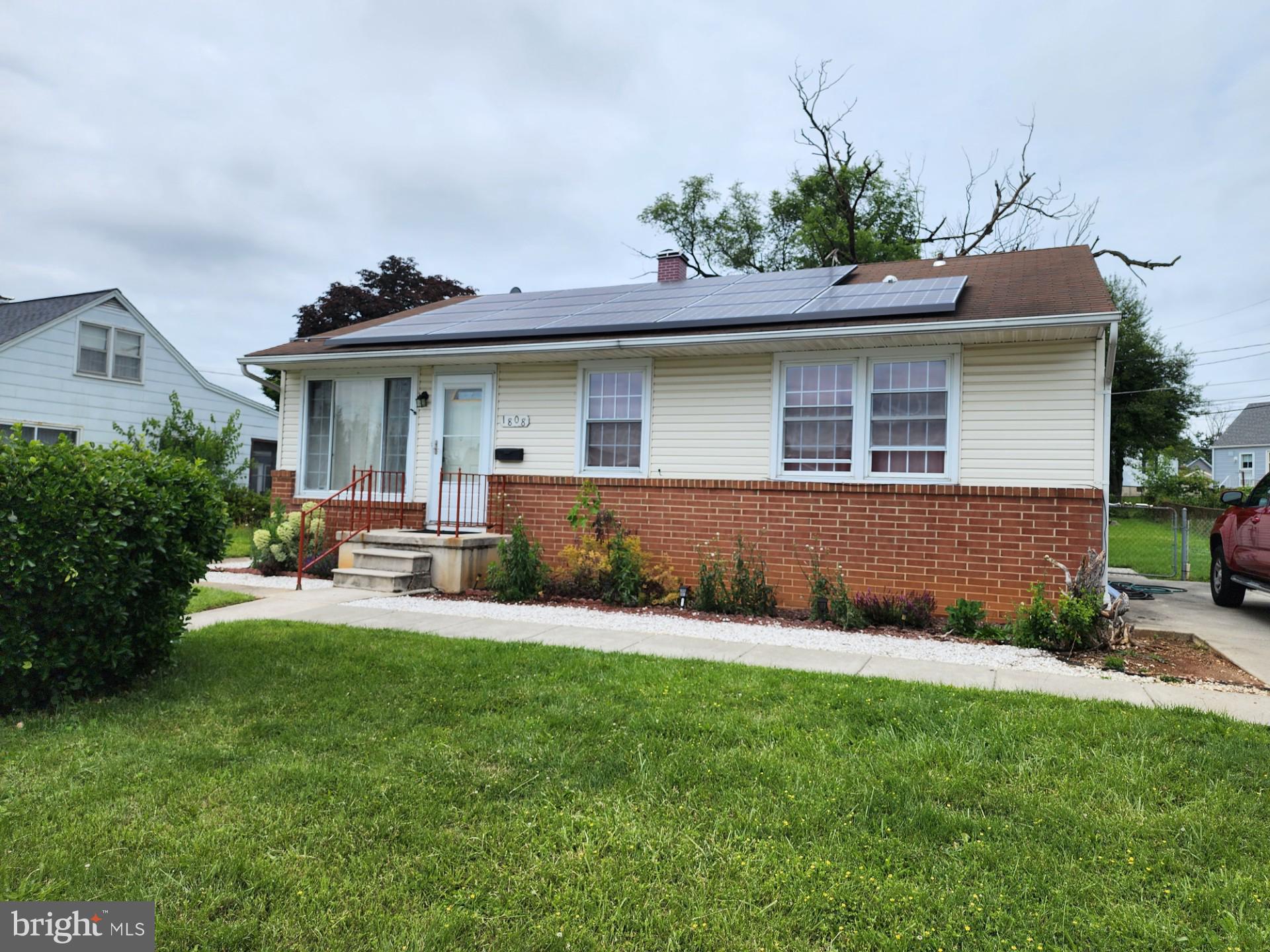 This charming ranch-style home, built in 1967, offers a perfect blend of comfort and functionality. With 1,608 square feet of thoughtfully designed space, this residence features four inviting bedrooms and two full bathrooms, ideal for both relaxation and entertaining. Step inside to discover warm wood floors and an abundance of natural light, enhanced by recessed lighting and ceiling fans throughout. The walk-in closets provide ample storage, while stylish window treatments add a touch of elegance. The heart of the home is the well-appointed kitchen, featuring stainless steel appliances, including a self-cleaning oven, built-in microwave, and dishwasher, making meal prep a breeze. The adjoining laundry area, located in the fully finished basement, offers both a washer and dryer, ensuring practicality and ease. Outside, the property boasts a well-maintained exterior with brick and vinyl siding, complemented by sidewalks and street lights that enhance the neighborhood's charm. The driveway accommodates up to three vehicles, providing ample parking for guests. With a large fenced rear yard, there's plenty of room for outdoor activities or gardening. This home is not just a place to live; it’s a sanctuary where memories are made. Experience the warmth and comfort that this delightful property has to offer. The property is being sold AS-IS.