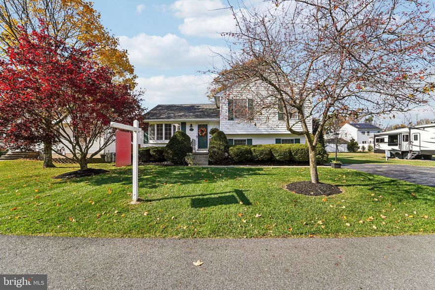 Welcome to 118 W Virginia Ave in Grande View Park, a move-in ready split-level home with a practical layout and convenient location. Situated near I-97, MD-32, and I-295, the home offers easy access to Fort Meade, BWI Airport, Northrop Grumman, and NSA, with MARC and Amtrak stations nearby for travel to Washington, D.C. and Baltimore.

The main level features a living and dining combination and a chef’s kitchen with stainless steel appliances, ample cabinetry, and counter space, flowing into a 17' x 17' all-season sunroom with a heat pump.

Upstairs, there are three bedrooms, including a primary suite with a full bath and closet space. The lower level offers a family room with a Mendota propane fireplace insert, full bath, and flexible space suitable for a home office, gym, or guest area.

Outside, enjoy a landscaped yard, 12x16 barn shed with loft, and a gravel RV pad with 50/30/120 amp power.Nearby amenities include Arundel Mills Mall, Maryland Live! Casino, local dining, and parks such as Severn-Danza Park and Kinder Farm Park. The property is being sold together with the adjacent lot at 116 W Virginia Ave, Severn, MD 21144 (MLS ID: Land - MLS# MDAA2130300). Hurry—this one won’t last!