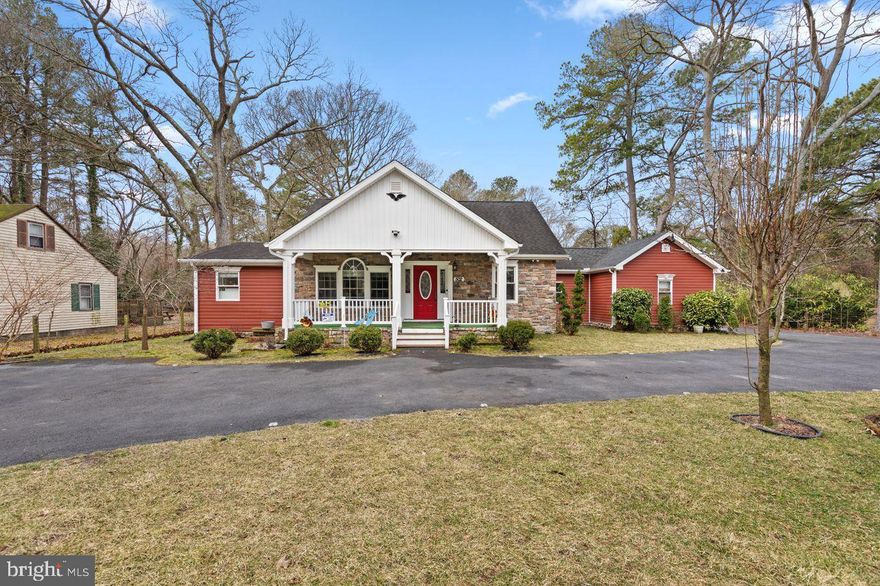 Beautifully rebuilt 9 year old 4+ BR / 2 BA, 1805 sq ft home  that was taken down to the foundation and rebuilt completely in 2017.   If the house isn't already great enough, you'll want to buy it just for the awesome yard! Front yard features a blacktop circular driveway, which also extends along the right side and around the back of the home, where you can enter the attached 1 Car garage. Tons of parking!  Enormous back yard with all the space you could need featuring 2 outbuildings, lean to area, open yard space, tall shade trees, soccer goals, trampoline (if desired), a masonry fire/grill area in the back, a firepit and seating area, patio and covered sitting area or storage.  Enjoy the oversized front porch with plenty of room for outdoor furniture, swings or a hammock.   Inside you find everything nicely up to date with a well designed kitchen with granite counters, tile floors, upgraded Samsung french door refrigerator w/ see through door, stainless gas stove & microwave.  Hardwood flooring, LVP and Tile cover all the floors with no carpet to deal with in the home.  The cozy livingroom is centered around an attractive gas fireplace with tile & stone surround, and enjoys lots of natural light through the large front windows.   A sunken dining room sits just off the kitchen and has a closet perfect for extra kitchen ware and dishes. (this used to be a Bedroom and could be a 5th BR if desired).  First floor Primary suite has hardwood, walk in closet with built in organizers, and a beautiful bathroom with tile floors & shower.  Bedroom 2 is also located off the living room with a stepdown to hardwood floors, & crown molding.  The guest bathroom is off the hall and features a granite topped vanity, tile floors and nicely designed tile shower.  Down the rear hallway you find a laundry closet with a full size stackable W/D and extra storage space.  There is an additional room on the 1st floor that connects to the garage and is currently used for storage or as an office but could be a bedroom if needed (no closet).  Hardwood stairs with carpet runner lead to the 2nd floor where you find Bedrooms 3 & 4 both with updated LVP flooring.  Only one has a closet but both function as Bedrooms for the owner.  There is so much to love about this home, and a lot of love was put into it.  Fruitland city water & sewer,  Heat Pump, gas FP and cooking.  Well for irrigation.  Home is being pre-inspected for smooth buying process!