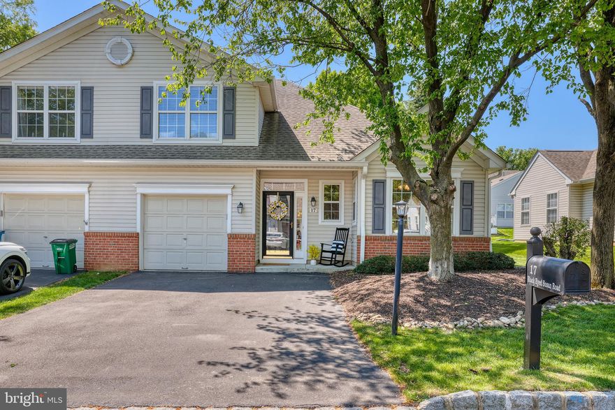 Tucked within the sought after Flowers Mill 55+ community, this lovely Curtis model offers easy living with a warm and inviting feel throughout. Sun filled living spaces and an open flowing layout create the perfect setting for both everyday comfort and elegant entertaining. The spacious kitchen offers gleaming oak cabinets, formica counters with a breakfast bar, under-cabinet lighting, stainless steel dishwasher and refrigerator, gas range, microwave oven and a charming breakfast room surrounded by sunny windows that overlook the peaceful outdoor setting.  The kitchen opens seamlessly to a dining room with ample room for a full-sized table and corner cupboard or side board.  The adjacent living room will beckon you to curl up for a good movie or linger with friends or family.  Looking for a great place to settle down with a good book or work remotely?  The sunroom offers the perfect spot and opens to a tranquil patio surrounded by mature landscaping, ideal for morning coffee or relaxing evenings with friends over cocktails. The spacious 1st floor primary suite provides a peaceful retreat with generous walk-in closet space and an ensuite full bath with dual vanity and walk-in shower with glass doors. A convenient laundry area, interior access to a one-car garage and nicely appointed powder room complete the main level.  Follow the main staircase to the 2nd level which boasts a large 2nd bedroom with double closet, full bath with tub and shower, and two storage areas.  Note new roof in 2019 (HOA responsibility) and new HVAC in 2022.  Move right in and take advantage of all the exceptional social activities and amenities that Flowers Mill offers including a clubhouse, indoor and outdoor pools, tennis, bocce and pickleball courts, fitness center, and scenic walking paths.  Live just minutes from quaint eateries, a local farm market, shopping, dining, and easy commuting to Philadelphia, Princeton Corridor, King of Prussia and NYC via I-295, Route 1, PA Turnpike and local trains.  Make this lovely home your own and soak up all the best that Bucks County has to offer...