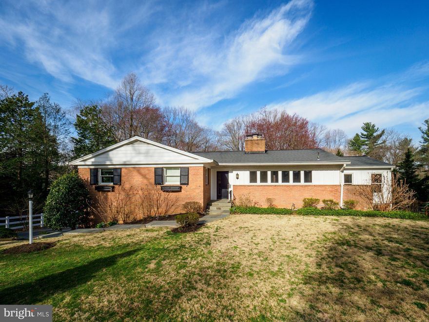 Breathtaking 3-bed 3-bath home, recently updated in beautiful Potomac Hills. Over 3600 sqft! Big, plentiful windows and gleaming hardwood floors make for a bright and airy home.  Spacious kitchen boasts ample cabinet space, breakfast bar, sparkling granite, and double oven. Master bedroom features luxurious en-suite bath and plentiful closet space. Take in the sights in lower-level sunroom with sweeping views of nearly 3/4 acre private lot. Possible 4th and 5th bedrooms on main and lower levels! Two fireplaces, in-ground pool, deck, and hot tub provide entertainment through all the seasons. Two-car oversized garage plus tons of driveway parking space. Nestled at the end of a quiet road with no through traffic. Under a mile to Potomac Village, convenient to Falls Rd, Potomac River, and C&O towpath.