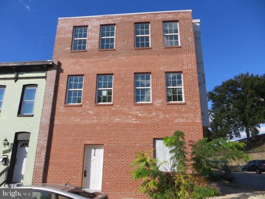 Investment opportunity in the Station North Arts District.  3600+ square feet of new constructions
(2) 4 bedrooms 1 full bath apartments up and 2 commercial units on the main level with full baths in each.  Newly constructed and nearly complete. Finish this offer and remaining few items and begin making money. Projected yearly income is $105k+. This building is perfect for programs requiring onsite management, groups etc. Zoned R8 . Buyer responsible for verifying they type of usage in the building. Contact housing for more assistance.