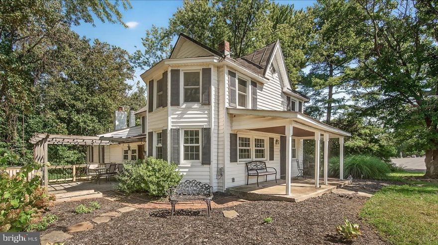 Prime opportunity to own this picturesque property perched on 1.31 acres! Charm shines throughout this historic home showcasing exquisite wood floors, wood beam highlights, oversized living room with stunning stone fireplace and updated kitchen tastefully blended between country and cozy. Stainless steel apllianes and granite counters surroubd the butcher block island!  The character abounds with features like orginal cozy ceiling heights, tin roof  and wood ceiling front porch. Cultivated yard to include hardscaping, fire pit, and fencing! Pergola covered paver patio and deck! Fantastic for entertaining or just relaxing.  Plenty of space for parking or to build on to! .Beautiful tree surrounds backing to Morgan Run. Located within the perfect distance of town-with easy access to amenities, shopping, restaurants, top rated schools, and numerous activities at parks like Piney Run and Liberty Reservoir. 312 Klees Mill is still moments from main artery travel routes like 26, 32, 97and 70. while being tucked away in a rural peaceful setting.

.