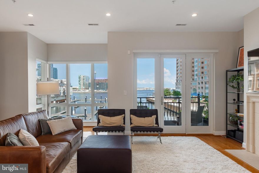Welcome to this beautifully updated 3-bedroom, 2.5-bathroom  Garage townhome, offering direct waterfront views and a lifestyle of tranquility combined with city convenience. Located just steps from the water, this home provides a perfect balance of modern amenities and breathtaking water views from every level.

Key Feature:
Prime Waterfront Location: Enjoy panoramic water views and direct access to the waterfront from your private balconies on every level.

Spacious Living: This home features 3 bedrooms and 2.5 baths, with an open and airy floor plan that’s perfect for both everyday living and entertaining tons of storage and half bath on main living area.  Enjoy your evenings relaxing in front of the fireplace or sitting on your balcony enjoying the view.

Updated Kitchen:  The gourmet kitchen has been fully updated with modern finishes. Enjoy this open concept living, kitchen island and separate dining is easy for everyday or entertaining. 

Hardwood Floors:   Gorgeous hardwood floors flow seamlessly throughout the main living areas, while the bedrooms are cozy with plush carpet.

Master Suite Retreat: The spacious primary suite features double sinks and a large closet, offering a private retreat with views of the water and your private balcony.

Updated HVAC: The home features a newer HVAC system for year-round comfort and efficiency.

Outdoor Spaces: Balconies on all levels provide the perfect spots to enjoy the serene waterfront setting, whether you’re unwinding with a morning coffee or hosting a sunset dinner from your rooftop terrace with unbelievable views of  Baltimore City's Beautiful Waterfront.

City Living at Its Best:  Located in one of Baltimore’s most vibrant waterfront neighborhoods, this home offers easy access to restaurants, shops, and all the culture the city has to offer.  

Location: This property is ideally located close to Johns Hopkins University, the University of Maryland, and is just minutes from I-95 for easy commuting. Enjoy quick access to downtown Baltimore, as well as nearby restaurants, shops, and cultural attractions.  

This stunning waterfront property combines luxury, comfort, and style, making it one of  Baltimore City Premiere properties.  Don’t miss your opportunity to make this your new home—schedule a showing today!

 
--