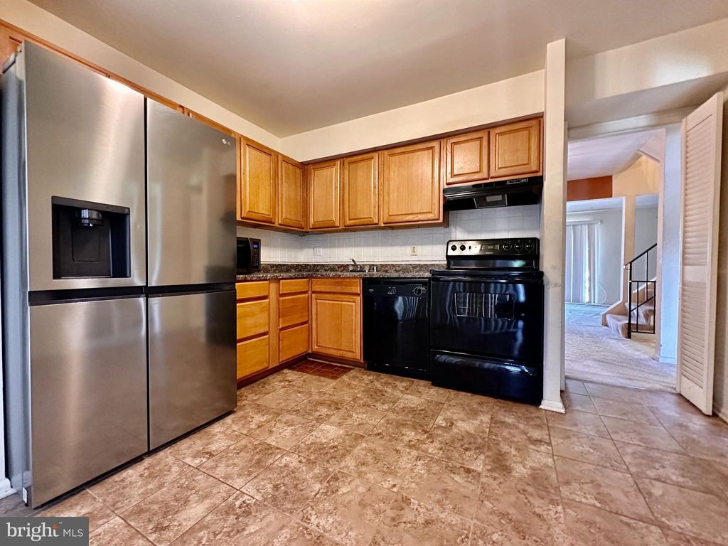 Photo of 3846 TWIN LAKES CT, WINDSOR MILL, MD 21244 (MLS # MDBC2061792)