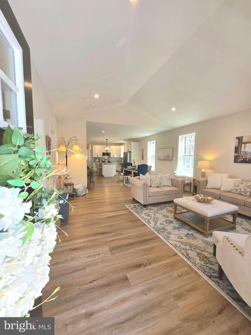 Welcome home, to this inviting new construction home, just completed in water-oriented Kent Island Estates. 3 bedrooms and 2 full bathrooms wait for you to move in and enjoy the KI lifestyle as soon as you do. The spacious family room boasts a cathedral ceiling and is open to the kitchen with plenty of extra room to add a dining area or make the space to suit your own needs/wants. The kitchen has SS appliances, granite countertops, a stylish backsplash and crown molding on the crisp white cabinets. The kitchen island has plenty of room for seating for a quick meal or snack. The kitchen also includes 2 pantries for plenty of storage. The primary bedroom has an ensuite bathroom with a double vanity and a custom tiled walk-in shower. It also includes a walk-in closet. The other full bathroom features a tub/shower combo. This home has LVP flooring throughout, which will make cleaning a breeze. The home has 9ft ceilings in its entirety, except the cathedral in the family room (referenced earlier). All the bedrooms have upgraded closest systems.  Also, for your peace of mind it includes a fully encapsulated crawlspace, which has a sump pump. 104 Cecil Road is almost 1,500 sqft with a Lot size that will be super easy to maintain. Leaving you more time to go boating, kayaking, SUP, fishing, crabbing or take a short stroll or bike ride to the Romancoke Pier. Be on the water within minutes of arriving home. The Blue Heron golf course, South Island Trail (a 7-mile paved trail), beaches, marinas and parks are all minutes away. Don't forget all the amazing restaurants, coffee shops, and other local small businesses that are what make KI special! Call today to schedule your private showing! MHBR: 7172