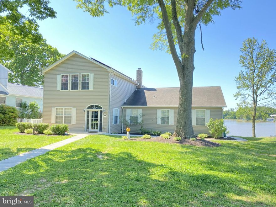 Waterfront Splendor! Welcome to this beautiful home prominently situated overlooking Bird River, within minutes to open water on the Chesapeake Bay. Sitting on over 1/2 acre this beautiful property boasts over 100 feet of shoreline. Completely remodeled in 2010, with two custom-built additions, there are over 3340 square feet of finished living space, loaded with water views to be enjoyed from every level! The front door opens to a welcoming two-story foyer and open staircase flooded with light from the skylights above. The main level offers an open floor plan with patio doors opening to an expansive deck overlooking the water, ideal for entertaining on a summer evening. The gourmet kitchen features high ceilings, stainless steel kitchen appliances and an island with bar seating where the cooks can be a part of the activities. A free-standing wood stove in the living room provides a cozy setting for evening memories. The main floor primary bedroom has direct access to the deck and the full bathroom which features an exquisite soaking tub, double vanity and separate shower. There are two additional bedrooms on the main level, one with an ensuite bathroom. The light-filled owners suite, located on the second level, opens to a walkout balcony ideal for soaking in rays by the water, taking in the views up and down the river and enjoying beautiful sunsets. It features an ensuite bath, large walk-in closet and its own laundry setup. A second upstairs bedroom is a great option for the home office.  The lowest level features an in-law suite or income producing apartment with its own private entrance, a large bedroom with access to the patio, full bath, laundry room and separate office space. The kitchen living area also opens to the patio with garden and river views. The unfinished portion of the basement has patio access and is large enough to set up a home gym, a workshop and a home theater. The new asphalt parking area can easily accommodate 6 cars. Maximize your enjoyment of a waterfront lifestyle with the private dock perfect for launching a boat or kayaks to explore the river and bay. This amazing property is a must see...Schedule a showing today!