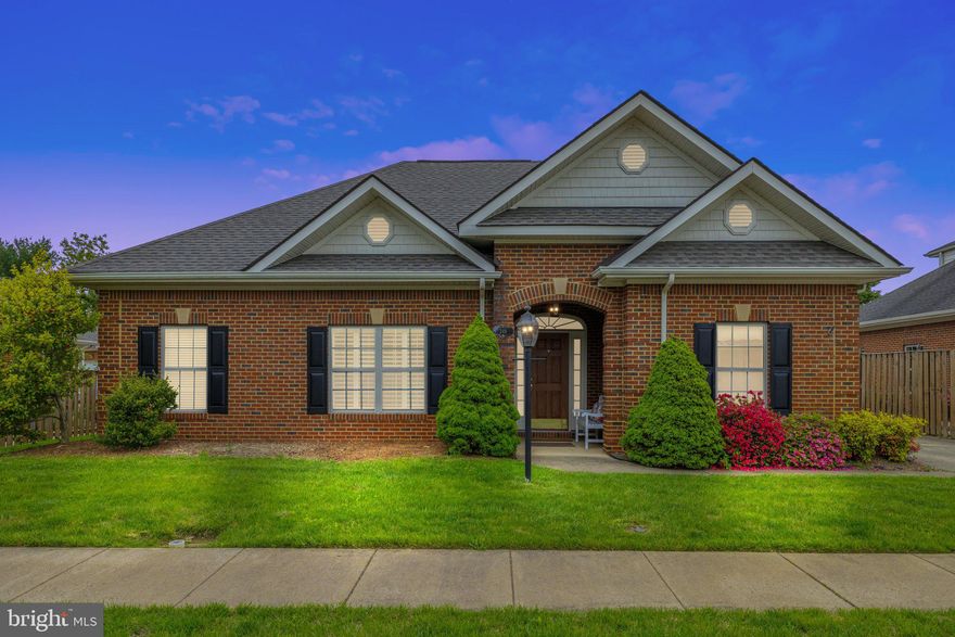 Beautiful brick carriage home in sought-after Carriage Chase.   Lovely, open floor plan with large living and dining areas, light-filled kitchen with breakfast nook and spacious laundry room.  The home has a split bedroom plan with the master suite located privately to the far right side of the home and two additional bedrooms  and full bath on other side.  The master suite has a large bathroom and walk-in closet.  A screened porch overlooks the back yard which is fenced and private.  The oversized garage has built-in shelving and pull down stairs to the attic.  The quarterly HOA fee covers lawn maintenance, trimming of shrubbery, and snow removal on the streets.  This terrific neighborhood is close to shopping, hospital and all that Old Town Warrenton has to offer!