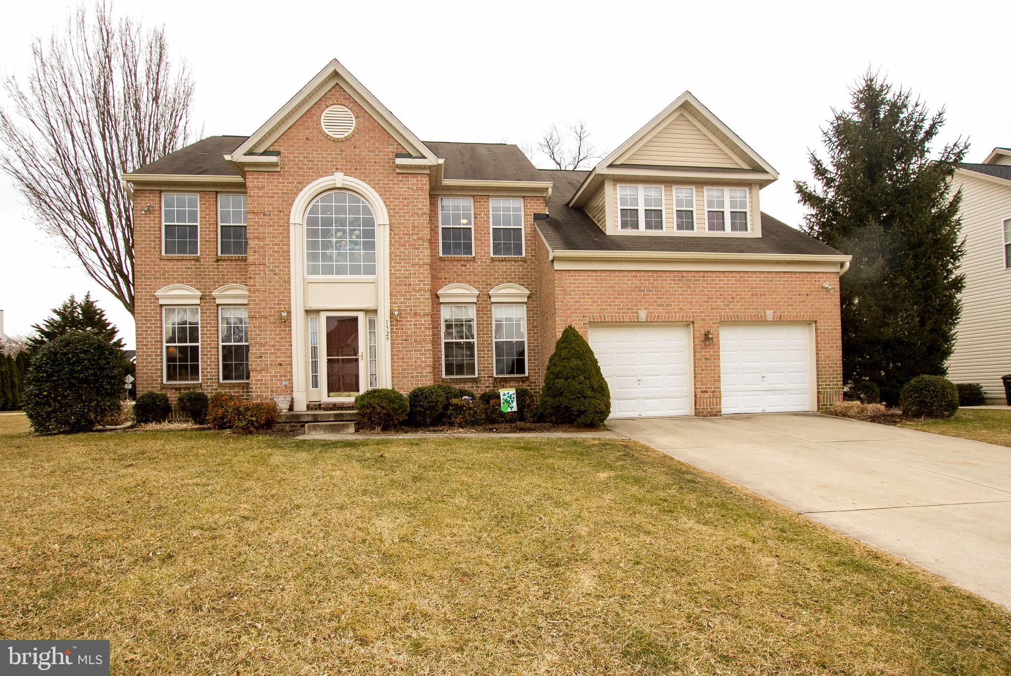 This home is the Fallston Model with the upgrade elevation w/Brick, wide areaway. The living room has a fire place with hard wood floors. Also there is a lovely sunroom . The library has a bay window. The master bed room has an additional sitting room and a 6' Whirlpool tub in the master bath room. The lower level recreation room has a full bath and an exercise room.