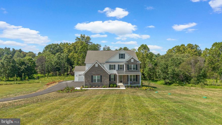 Experience the unmatched feeling of “brand-new” in this stunning custom-built estate, completed in October 2024. Perfectly nestled on a private 2.5-acre homesite, this home offers over 4,600 sq. ft. of living space above grade, a fully finished basement, and an impressive 4-car garage providing plenty of room for both living and storage. Step inside and you’ll immediately notice the open-concept design, soaring tray ceilings, and abundant natural light that fills every corner. The spacious formal dining room sets the stage for elegant gatherings, while the cozy fireplace creates a warm and inviting ambiance. The luxury kitchen is a chef’s dream, featuring stainless steel appliances, a double oven, walk-in pantry, and an oversized island perfect for cooking and entertaining. Just off the kitchen, enjoy the brand-new deck built in 2025, where you can take in peaceful views of your expansive property. Upstairs, the primary suite is a true retreat. Unwind in the spa-inspired bathroom with a soaking tub beautifully centered as the focal point, a large glass-enclosed shower, and dual vanities. With 7 bedrooms and 6 full bathrooms, there’s space for everyone to relax in comfort. This home is less than a year old and still has that “new car” feel of an incredible opportunity to own a brand-new property without the wait! Don’t miss your chance to call 21708 Woodfield Rd home. !WELCOME HOME!