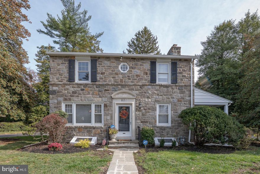 Welcome to this traditional stone 2 story colonial in Drexel Hill with loads of curb appeal.  This home is situated on an oversized lot with classic hedges around the property.  There is a large driveway with ample parking.  As you enter this home through the classic center hall, you are impressed with the fresh paint and gleaming parquet floors.  To the left of the entrance is a generous sized dining room.  Many family dinners, memories and celebrations were in this room. The dining room is adjacent to a bright kitchen with white cabinets, quartz countertops, tile back splash and all new stainless-steel appliances.  The kitchen is large enough to accommodate a table.  There is a side door entrance to the kitchen.  There is an oversized room adjacent to the kitchen that is a fourth bedroom, currently used as a family room.  This room has a large window overlooking the rear yard.  Back in the entrance hall the imposing living room is on the right with a fireplace and is large enough for a piano!  This room has French doors to a covered outdoor patio that could be enclosed for additional living space. The living room leads to hallway with updated first floor powder room, which is convenient for the main floor.
Upstairs is a generous sized primary bedroom and two more bedrooms.  The hall bath has been updated with new plumbing.  There is a door from the hallway to the roof of the room below.  This space could also be enclosed for another bedroom, office, etc.
The kitchen side door leads to the patio and generous flat back yard. This space is perfect for grilling and outdoor parties. The yard has been newly landscaped.
The dry basement has been newly painted.  The Heating and Air Conditioning systems are brand new.
This home has the size and amenities for a blended or multigenerational family.  There are many options! The square footage does not include fourth bedroom/family room.  Don’t miss this opportunity for your new home!
The location is convenient for shopping schools, transportation, and a short commute to center city Philadelphia.
Showings start on Nov. 1 at Open House!