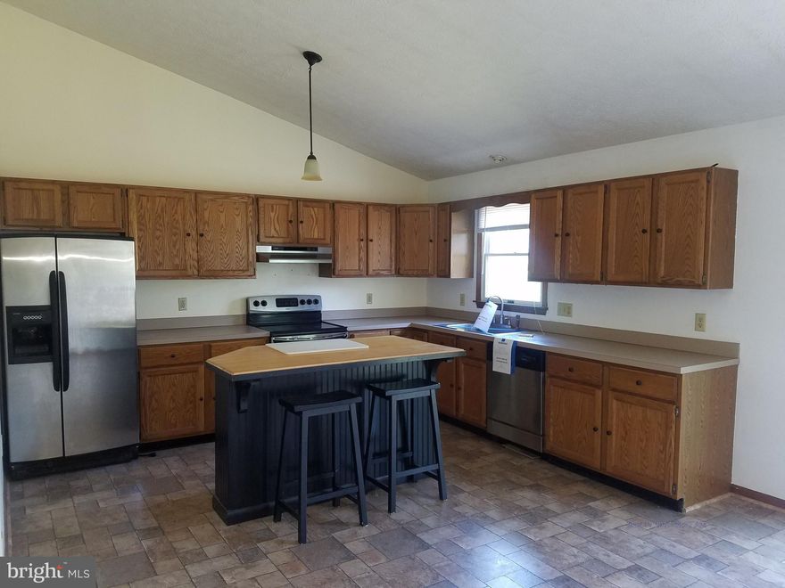 This home shows well, deck off back. All appliances are as is, refrigerator has internal leak. Breakfast bar in kitchen.  Master bedroom with bathroom. Family room in lower level. Property sold as is. Please see documents in MLS to be submitted with offers. Seller will not split transfer and recordation, buyer pays all.