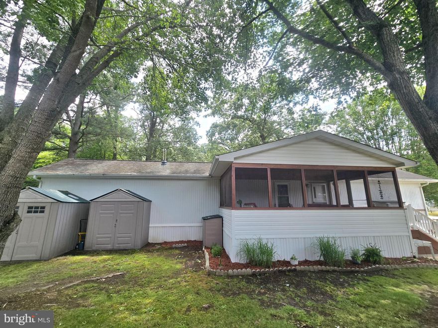 Presenting Oakwood model move in ready 3 beds, 2 baths located less than 8 miles to Lewes Beach, Rehoboth Canal, and less than 2 miles away from a pier dock with kayak launch and boat slips with easy access to Love Creek.  This beautiful mobile home located in Cherry Creek Valley Subdivision was built in 1996 estimated 980 sqft of space with screened in porch.  Land lease is currently $499 per month.  Buyers are contingent on park approval owner/ seller is real estate licensee in state of Delaware.   Cherry Creek Valley is in the sewer expansion district.  Home is not available for rent nor allowed to be rent out per park rules.  The mobile home is for sale "As Is." Buyers will be responsible for the full dmv doc fee at settlements well as the other customary closing costs.  Surveillance in place to monitor/save recording.  Please discourage from showing up at Cherry Creek Valley Subdivision without a scheduled showing.   All showings must be accompanied by the buyer's real estate agent of their choice with buyer's agency signed per NAR and Sussex County Association of Realtors.  Thank you for showing your interest and we look forward to meeting future buyer of this one of kind fully furnished mobile home.