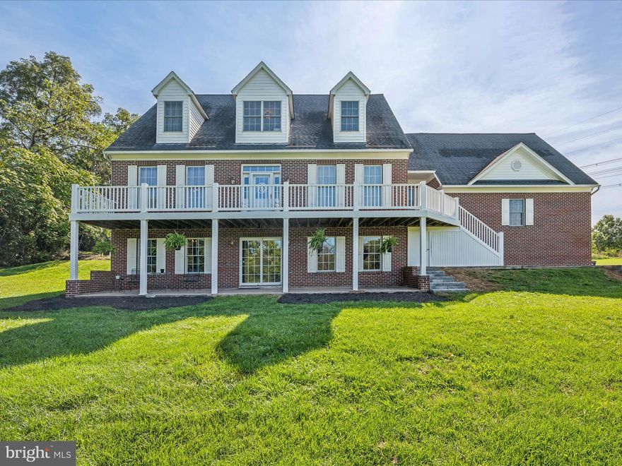 Charming Custom Built Cape Cod Home on 5 Acres with Modern Upgrades This expansive Cape Cod home boasts 4 bedrooms, 3.5 bathrooms, and over 3,700 sq. ft. of living space, all nestled on a picturesque 5-acre lot.  (All dimensions are approximate)The home features elegant formal living and dining rooms, perfect for hosting gatherings. Enjoy the rich warmth of hardwood floors throughout. The large deluxe kitchen is a chef’s dream, equipped with stainless steel appliances, a double oven, a convenient pot filler, and a butler’s pantry with an additional freezer. The spacious primary bedroom offers a walk-in closet and an en-suite bathroom with a soaking tub, separate shower, and dual vanities.  A versatile bonus room above the garage can serve as a 5th bedroom or playroom. The finished basement includes a 4th bedroom, a full bathroom, a second family/rec room, and a kitchenette—ideal for an in-law suite or extra living space. Enjoy a 60x100 ft. paddock suitable for two horses, goats, or other animals. The property offers beautiful views and is just minutes from Historic Charles Town, dining, and shopping. All basement doors are handicapped accessible, enhancing convenience and inclusivity.  Conveniently located for easy access to the DMV area, making this home perfect for commuters.