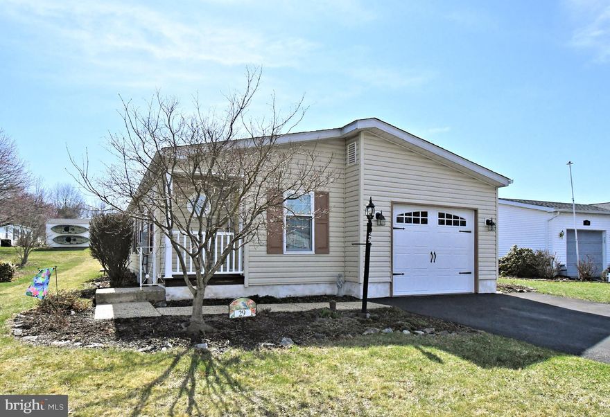 Welcome Home to this beautiful 2 Bedroom, 2 Bath  Quiet Acres Home!  This home offers a thoughful one-level layout with open living, dining and kitchen spaces designed for easy everyday living and entertaining.  The updated eat-in kitchen offers plenty of cabinetry, an island, stainless steel and appliances and access to the attached 1 car garage.  The primary suite has cathedral ceilings and nicely appointed attached bath.  Some of the upgrades include a new kitchen refrigerator, stove, dishwasher and floorin gin 2025.  The hot water heater was replaced in 2021, new carpet in 2022, new HVAC in 2017, new garage door in 2022, and screened-in porch converted to added space.  Roof replaced in 2016.  LThe wonderful back patio is perfect for summer barbeques!  Everything has been done and you can move right in!