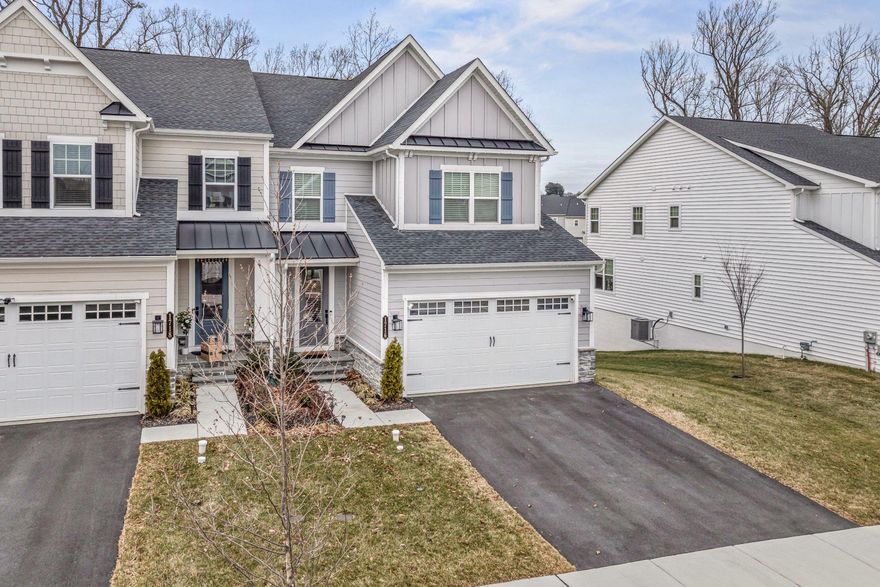 Discover an exquisite blend of luxury and comfort in this stunning Colonial twin home nestled in the prestigious Greystone community. Built in 2024, this residence boasts a meticulously crafted exterior featuring a harmonious combination of stone and HardiPlank materials, exuding timeless elegance. The inviting façade is complemented by beautifully landscaped surroundings, complete with exterior lighting and charming sidewalks that enhance the neighborhood's allure. Step inside to find a fully finished walkout basement, perfect for entertaining or relaxation, while the main living areas are adorned with rich flooring and plush carpeting, creating an inviting atmosphere. The heart of the home is the gourmet kitchen, equipped with high-end appliances including a built-in range, microwave, and refrigerator, ensuring culinary excellence at your fingertips. With four spacious bedrooms and three and a half luxurious bathrooms, this home offers ample space for both privacy and togetherness. The gas fireplace adds a touch of warmth and sophistication, perfect for cozy evenings. Outside, the rear yard backs onto serene open common areas and lush trees, providing a tranquil retreat. Enjoy the expansive deck, ideal for alfresco dining or morning coffee amidst nature's beauty. The attached oversized garage and driveway offer convenience and ample parking. Experience a lifestyle of elegance and comfort in this exceptional property, where every detail has been thoughtfully designed for the discerning homeowner. Embrace the luxury you deserve in this remarkable residence.