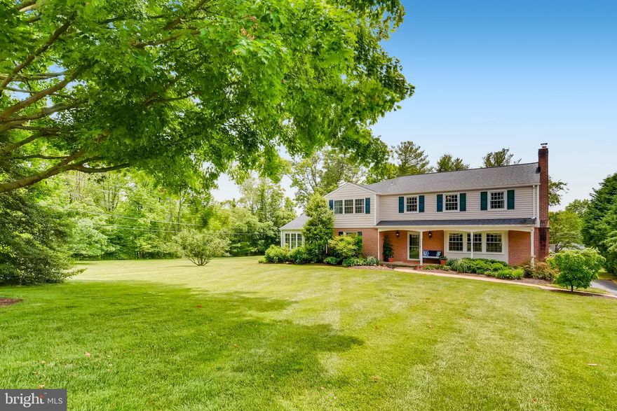 Totally transformed colonial with chic contemporary design elements situated on .56 acres in Ruxton adjacent to greenspace - completely renovated and expanded in 2019 to create a two-level addition with new primary bedroom suite and light-filled great room wide-open to wow gourmet kitchen. Designed and reconfigured to create an open floorplan and capture a main level bedroom suite/home office adjacent to living room with second fireplace, this masterfully constructed now 6 bedroom 5 full-bath home with understated neutral and stylish finishes, fine fixtures, custom built-ins, and solid hardwood flooring throughout features a remarkable white kitchen with 11' x 4' island, breakfast bar for 6, quartz counters, 6-burner gas range, stainless appliances, and wet and dry bars surrounding casual dining space. A multitude of improvements includes new lighting, windows, 3-zone HVAC, whole-house generator, bedroom level laundry, and a finished walk-out basement with new full bath, fitness, media/recreation, and game rooms opening to level lawn for play. Entertain conveniently through great room and kitchen sliders to large rear Trex deck for alfresco dining or stretch-out on the expansive terrace around the saltwater pool to enjoy cannon-ball splashes. Just minutes to abundance of schools, popular shopping centers, neighborhood village with grocery and boutiques, I-695, and the best of metro Baltimore on the harbor.
