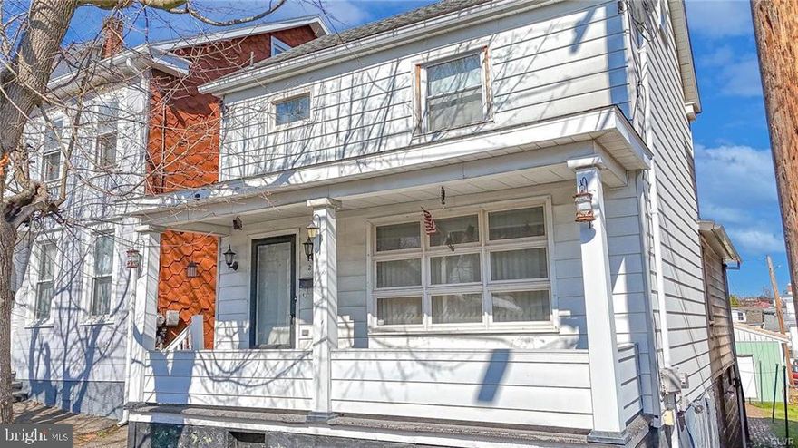 This Tamaqua single home offers abundant space with a marvelous garage and excellent proximity to schools and downtown! The covered front porch welcomes you into a beautifully open-concept main level. A gently separated foyer is open to a sprawling living room, an eat-at island delineating the kitchen, and completes with a dining area. A convenient water closet offers main level facility. To the rear, a mud room offers access to the fenced yard while a family room offers more living space with large windows facing southwest, ideal for views of rolling hills. Upstairs, the rear bedroom at nearly 200sf is a marvel with its multiple closets! Two other well-sized bedrooms with generous closets and a full bath with ceramic tile wainscoting and shower surround complete the second floor. The attic offers additional living space that could quickly become a lovely fourth bedroom! The walk-out basement offers utility and laundry facilities, as well as an additional toilet and stall shower! The yard leads to a tremendous garage to the rear with 576sf of concrete floor space and 9'4" clearance to the means with storage potential above! This oversized space is ideal for auto storage, a workshop, an ample blank canvas! Close to Tamaqua's growing downtown and Tamaqua Schools where graduates qualify for the LCCC two-year scholarship program! Don’t miss this marvelous home!