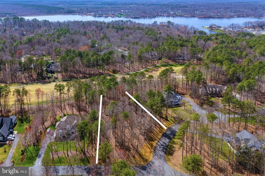 Here's an incredible opportunity to own an amazing wooded home site overlooking the Golf Course, inside the gated resort style community of Fawn Lake! Surrounded by beautiful custom homes, this 1+ acre property is the last remaining unimproved lot in a highly desirable area of Fawn Lake! Located  on the breathtaking 17th Fairway and within walking distance to the beach, tennis courts, Country Club Restaurants, marina, and all the wonderful amenities Fawn Lake has to offer! The property, encompassing a large corner, offers privacy and endless design possibilities.  From a coastal farmhouse or a charming Rancher to a sprawling mansion! Come build the House of your dreams and start enjoying the ultimate Fawn Lake lifestyle! Bring your house plans, or have it designed and built by one of Fawn Lake's highly rated preferred builders! *** The beautiful luxury gated Fawn Lake Community offers amazing amenities such as a boating recreational lake, soccer and ball fields, basketball and pickle ball courts, dog park, volleyball courts, walking trails, Club House, marina, fitness center, Lakeside Restaurants, Country Club, playgrounds, and so much more! Located on the countryside near protected park lands and only a few miles to the farmers market, wineries, and award winning brewery!