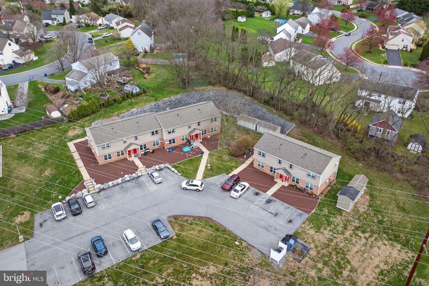 Hard to find and well-maintained 12 unit apartment complex is situated on a generous 2.9-acre lot. Constructed with vinyl siding and brick, this property boasts a solid foundation and is in very good condition, ensuring minimal immediate maintenance costs for investors. Some updates include new roofs and siding in 2019 and exterior doors and 84 windows replaced in 2023. The interior features a blend of carpet and ceramic tile flooring, providing for comfortable residential units. Each has a private entrance, all appliances and laundry. Each unit also has access to their own private storage unit and assigned private parking. Accessibility is a key advantage, enhancing the property's appeal to potential tenants. This property is strategically positioned to capitalize on local market demand, making it an ideal choice for investors seeking to generate consistent rental income. The current owner covers essential expenses such as trash, water, sewer, real estate taxes, and insurance, streamlining operational management. With no association fees or restrictive amenities.  The low overhead costs and well managed property positions it as a lucrative addition to any investment portfolio. Seize this opportunity to invest now.