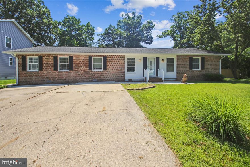 This home has it all! Updated eat in kitchen with granite counters & stainless appliances. Roof replaced within the last 10 years. HVAC replace with Trane System in 2020. 6ft tall privacy fence for your double lot rear yard with deck. Walk to the community pier & water access one block away. While home has been freshly painted. Primary suite with additional sitting area & private full bath with walk in closet & separate outside entrance. Much larger than it appears! All situated on a double lot with 6ft privacy fence with deck on back.