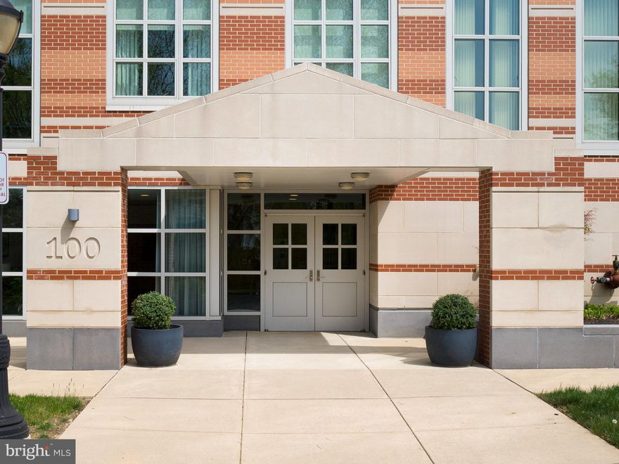 An exceptional top-floor residence in the highly sought-after Pembroke North. This bright and beautifully maintained one-bedroom plus den (ideal for a home office and/or guest space), 1.5-bath condo features soaring 10-foot ceilings and expansive windows that flood the home with natural light. Perfectly positioned facing Lancaster Avenue, this is one of just three one-bedroom units in the building.
The open-concept layout seamlessly connects the kitchen, living, and dining areas, creating an inviting space for both everyday living and entertaining. The kitchen is thoughtfully appointed with sleek cabinetry, GE Monogram stainless appliances, and rich wood flooring. The living room is a true showstopper, highlighted by a dramatic wall of floor-to-ceiling windows and access to a private balcony.
The spacious primary suite offers a peaceful retreat, complete with a generous bedroom that includes black out and sheer shades, a custom-fitted dressing area with ample closet space, and a luxurious en-suite bath featuring a frameless glass shower, double vanity, and a deep jetted soaking tub. A convenient in-unit laundry area with washer and dryer adds to the home’s ease of living.
This residence includes 2 assigned parking spaces and a private storage locker within a climate-controlled garage.
Designed by renowned architects Robert Venturi and Denise Scott Brown, Pembroke North is celebrated for its distinctive architecture and thoughtful design. The building proudly holds Gold LEED Certification, reflecting its commitment to sustainability and energy efficiency, including geothermal heating and cooling systems.
Ideally located just moments from the heart of Wayne, residents enjoy easy access to vibrant shopping and dining, nearby train stations, and major highways, making this home as convenient as it is refined.