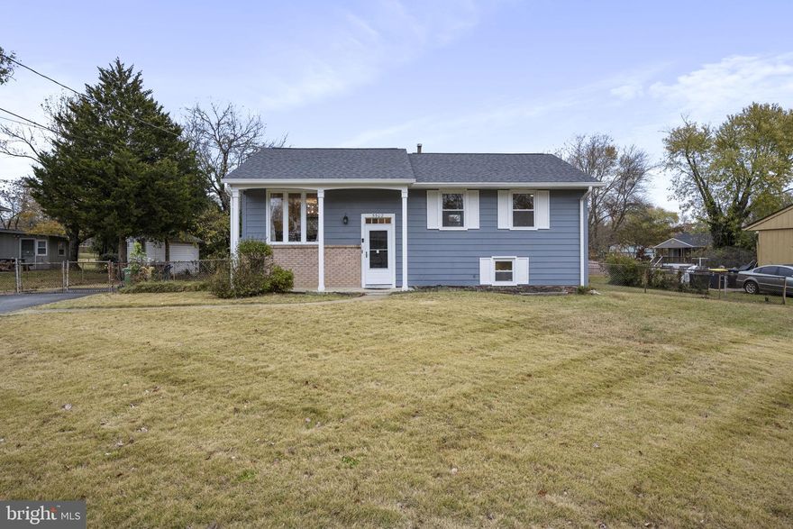 Welcome to this charming 4 bedroom home, located in the lovely Darcey Estates community, and within 15 minutes of downtown DC, 10 minutes from National Harbor, and less than 10 minutes to Joint Base Andrews. Upon arrival you'll be impressed by the large front yard, 2-car driveway, and massive rear yard which is fully fenced-in! Once inside, the split-level foyer only requires minimal steps up to the main level, where you'll find a formal living area with a large South-facing bay window, dedicated dining space, and an open kitchen plan which is open to the rear bonus room ideal as a breakfast area, reading room, or play room, and allows direct access to the rear yard. Head down the hallway to the bedrooms, and you'll enjoy a spacious primary bedroom, and two additional bedrooms with floor-to-ceiling closets, new ceiling fans, and an updated shared bathroom in the hall. The fully finished lower level includes a large recreation room, recessed lighting, luxury vinyl flooring, a bonus kitchen/wet bar with plenty of storage cabinets, and a large legal bedroom with attached full bathroom, and walk-in closet. This space is ideal as an in-law suite, or maybe even potential rental income! New HVAC! New roof! New gutters! New lighting fixtures! Upgraded electrical panel! WOW! What a lovely place to call home!