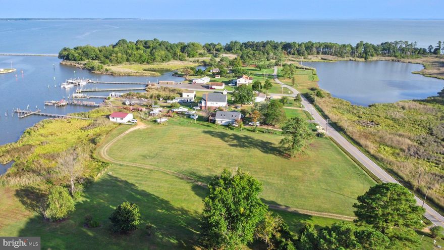 Over 3 acres on Saint Georges Island w/ 100+ feet of water frontage on Protected Island Creek. Easy access through the nearby channel to both the Saint Mary's River and the Potomac River.  Serene and lovely water views abound. Build your waterfront dream.  Lot is clear and level with a 175'+ long pier. Boardwalk and Pier extend through the lovely Tidal Marshlands out into Island Creek to this lots private multiple slips. 4' deep at slips so great for your watercraft, crabbing, fishing and kayaking.  Large 26 x 26 Boathouse is fantastic for storing your toys and grabbing some shade and has electric service.  Lot also has a well and hook-up is available to METCOM /public sewer; property has a sewer allocation (EDU) so no need to worry about an on-site septic system or mound on your pretty property.  Enjoy biking,  local hotel and restaurant (Ruddy Duck) on Saint Georges Island. Watch beautiful Heron, Osprey and Eagles. Not ready to build? This is a perfect place to tuck in with your RV and enjoy with your family and friends. Only 15 minutes to NAS Patuxent River and just 25 minutes to all this pretty areas shopping and amenities in Leonardtown, California and Solomon's. 1.5-2 hours from NOVA & Washington DC Proper.   
Boaters Information:  By Water approximately 2.6 miles to Ruddy Duck, 3.2 miles to Pier 450, 3.4 miles to SALT, 9.4 miles to Point Lookout and just 11.7 miles to the confluence of the Potomac River and Chesapeake Bay; one of the East Coast's best fishing areas "they say"! 
Escape to beautifully scenic and historic Saint Mary's County MD!