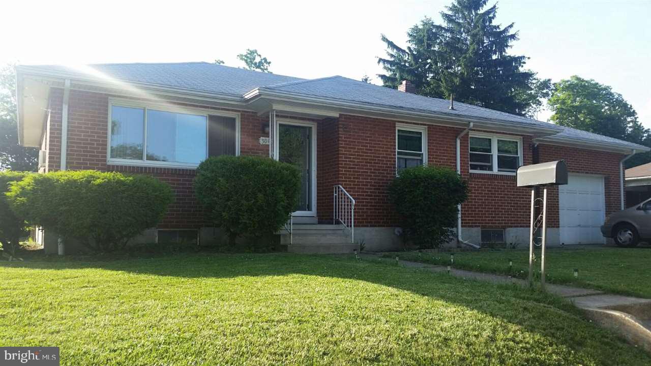 2BR brick ranch w/corner lot. Partially finished basement.