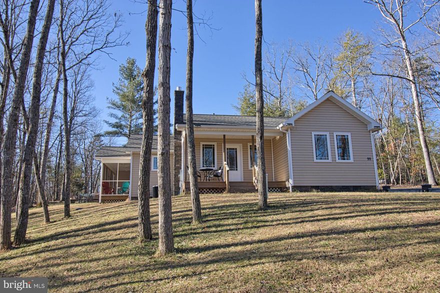 Like new home built in 2017.  Beautiful inside and out with 3 bedrooms and 2 full baths. Kitchen has granite counter tops and a large island. Recessed lighting and stainless steel appliances.  Beautiful Hickory hardwood floors.  Fireplace in living area with gas logs also has built in shelves.  Master bath has tiled shower and soaker tub.  Attached garage with side entry also has large screened in porch off of kitchen with two outside ceiling fans.  Right off of the screened in porch in a large patio for entertaining.  Great location for relaxing.