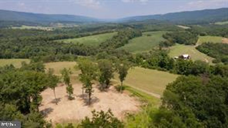 SOLAR LEASE! 20 YEAR, $38,475.00 the 1st YEAR, APPROX.  2% INCREASES EACH FOLLOWING YEAR! Apply Lease $ to Payment and is approx. payment as 2% Interest Rate loan. Apply to Principle & Pay Off 20 Year Loan in approx. 11 Years! WHAT A DEAL! Seller says bring offers! Click on the Video Icon for the Must See Aerial Video Tour! Discover Your Dream Estate! 180.35 Acres of Unmatched Beauty Looking for the perfect hunting spot? Desire to create a massive family compound? Or maybe you could split for five huge estate lots? This extraordinary 180.35 acre property offers endless possibilities for your wildest aspirations! A Haven for Wildlife: With 112 acres of suberb wooded land, this property is a haven for large whitetail bucks, wild turkeys and a host of other wildlife. 5 elevated hunting blinds are already in place for your convenience, and there's even an area with a 700-yard long-range shot for the ultimate hunting experience. Breathtaking Views: Imagine waking up to an amazing 12-mile view from this potential building site. This property boasts unparalleled scenic beauty that will leave you in awe every day. Versatile Open Space: 68 acres of open and or tillable land that also has potential for your wildlife food plots. This offers versatility for farming or recreational activities. The high-yield fertile soil promises great potential also for your agricultural endeavors. (See Photo of Person Standing By this Year's Corn Crop) Solar Lease Opportunity: Don't miss the chance to earn $38,475/year through a solar lease program that increases incrementally throughout the lease. We'll be happy to provide you with all the details you need! Accessible & Convenient: Over 2 miles of well-cut roads make most of the property easily accessible by Pick-up, SUV, or side-by-side vehicles and many areas are drivable with a car. Plus, you're
 conveniently located just 4.5 miles from Interstate 70, making travel a breeze. Prime Location: Situated near Forge Rd and Mill Dr, this property boasts an impressive 1,500' and 1,800' frontage on the 89.46-acre parcel. The additional 90.89-acre parcel also features 2,400' frontage on Mill Dr, providing ample opportunities for development. Not to mention having additional stand access from multiple roads to sneak to your stand for those elusive monster bucks. Outdoor Oasis: Love fishing? A spring house awaits, and there's even a perfect area to create your very own small trout pond for fresh fish or peaceful angling days. Or maybe take a short walk to fish for Trout in the well stocked Little Cove Creek. City Access: Despite the tranquil rural setting, you'll be pleasantly surprised by how close you are to key destinations. Hagerstown Airport is just 34 minutes away (Weekly Flights to Florida), while Chambersburg, PA, and Martinsburg, WV, are only 45 minutes away. Reach the Capital: Need to visit Baltimore, MD, or Washington, DC, frequently? No problem! You're just 1 hour 35 minutes away from Baltimore and 1 hour 45 minutes from the nation's capital. Further Commuting: Lancaster, PA, is a mere 2 hours 15 minutes away, ensuring your family and friends can visit without hassle. This is a once-in-a-lifetime opportunity to own a piece of paradise that meets all your desires. Don't miss out on this extraordinary property - contact us today for more information and to schedule your private tour!