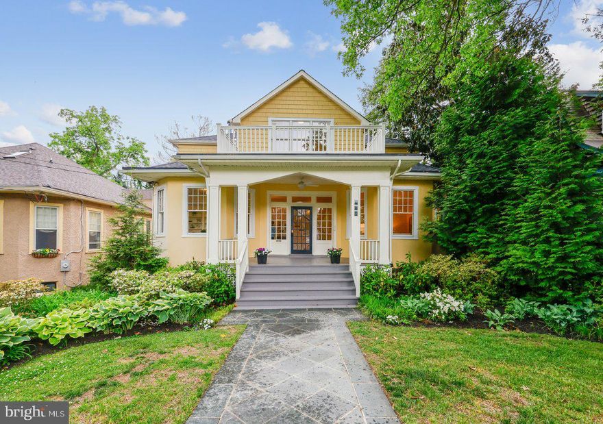 On a lovely tree lined street in the Village of Martin’s Addition, this sunny, spacious Victorian bungalow is brimming with charm and features open rooms that overlook a large deck and lovely back yard with beautiful trees and plantings. The large, welcoming front porch opens to a spacious, sunny entry hall, high ceilings and beautiful oak floors. This gracious entry hall adjoins the living room and library, and there is a large dining room, spacious family room with fireplace, a powder room and an updated kitchen with a sunny breakfast area overlooking the gorgeous back yard. There are four bedrooms and two bathrooms on the second floor, featuring a sunlit primary suite with ample closets, a generous bathroom with two vanity areas, a chic shower and built-in cabinetry.  There are three additional bedrooms and a hall bathroom off the open skylit hallway. The lower level has a large rec room with adjoining laundry area, a den with a full bath and ample storage spaces.
From the family room, you can walk out to the large deck with Trex flooring that overlooks the lush back yard with a variety of picturesque plants and trees. Complimenting the architecture of the house is a detached one-car garage with a handsome staircase leading to a loft area that could be finished into an artist’s studio or home office.
The home is located off Brookville Road, which features the shops on Brookville, and in the next block, the wonderful neighborhood favorite, La Ferme Restaurant. Around the corner and up the street is Shepherd Park, an ever-popular children’s playground.
This unique and charming home has all the architectural charm of 1916, when it was built, and the sunny open spaces and well-planned updates that make it a truly remarkable Chevy Chase home.