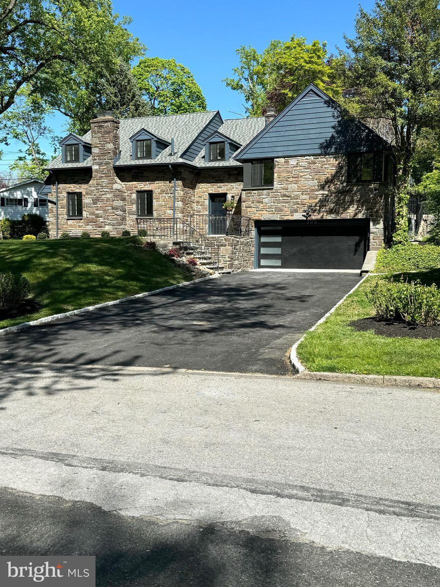 Welcome to your meticulously redesigned and totally renovated  Cape-Cod style home in the award-winning Lower Merion School District. This stone home offers the perfect combination of classic charm with contemporary comfort.
 Nestled on  a cul de sac  street in a Bala Cynwyd's quiet neighborhood, this home exudes vintage charm from its stone exterior, standing out amidst the surrounding landscape and avoiding the generic look of many new constructions. This stunning 4+-bedroom, 4.5-bathroom home has been meticulously transformed into a modern masterpiece, offering unparalleled comfort and style.
As you step up from new-paved asphalt driveway along new bluestone steps, get on front fenced stone patio, walk through the front door, prepare to be captivated by the modern elegance that defines the interior. 
 Inside, two-story foyer connects two open floors. The inviting living room, bathed in natural light pouring through large Anderson windows, frames picturesque views of the surrounding neighborhood and the park crossing street. The elegant fireplace adds touch of warmth and charm, creating the perfect ambiance for cozy gatherings.  The modern kitchen boasts high-end appliances (Wolf/Subzero), offering the perfect space for culinary enthusiasts to create and entertain. Expect nothing less than high-end finishes, state-of-the-art appliances, and an open-concept layout that enhances the spacious feel of the home. 
 The lower level on ground features an additional room with a walkout door, providing versatility as an office or extra bedroom. The 2-car garage and expansive basement with many windows offer endless possibilities for entertainment, a home gym, wine storage, or additional living space.
The second-floor level features 3 bedrooms, two bathrooms, one of them with higher ceiling is a suite with its own bathroom. The top level features a hug master bedroom with two walk-in closets, marble shower and round bathtub stand out as the master bathroom. 

Outside, a rear flagstone patio next to kitchen offers BBQ space and rear street entrance for convenience . The patio connects swimming poor through stone walkway. Totally renovated inground swimming pool is surrounded by large pool deck with new beautiful flagstone and landscaping, creating a serene oasis for outdoor relaxation and entertainment. 
Large and rarely deep up to 12 feet swimming pool was newly repaired, coated and painted,  replaced and upgraded all plumbing, electricity with new equipment, easier to be maintained 
The home features styled interior doors throughout, hard-cored or solid hardwood made, new windows with all new frames, exterior trimmed with water-resistant PVC boards, new solid hard wood floor throughout floors, new mechanicals, two new high-efficiency HVAC, new electrical wiring and plumbing, new framing around walls and insulated for whole house like a new construction , large and rare12-feet deep swimming/diving pool with new plumbing, electricity wires, equipment and new coating/painting.  
Live in a lux home like a new construction but with extremely low property tax. 
This home is next to big parks, walkable to Bala Trails, easy to access to I-76 , KOP, Conshohocken, and Philadelphia city.  
This home has all, insider and outsider, and is a must-see to be fully appreciated.