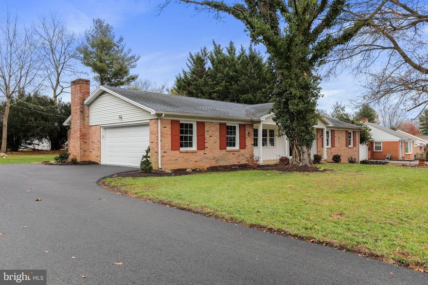 WOW! What a stunner! This home is exactly what you have been waiting for. Welcome the New Year in this completely updated, all brick, large 3 bedroom/2 full bathroom rancher in sought after Spring Valley neighborhood. No city taxes and no HOA. Tastefully updated from the roof all the way to the unfinished full basement, and absolutely everything in between. New heat pump, new hot water heater, new appliances (including full size washer and dryer), new carpet, re-finished hard wood floor in the living room, new windows, new garage door and driveway....and the list just keeps going. Enjoy the cold winter evenings in the spacious, comfy cozy family room with the wood-burning fireplace. The huge kitchen has granite countertops, stainless steel appliances, a large island with electric, recessed lighting, and plenty of cabinet and workable counter space that is perfect for holiday entertaining. The separate laundry room is conveniently located off the kitchen. Living room has beautifully refinished hard wood flooring. The three spacious bedrooms have plenty of closet space. The primary bedroom has a private bathroom with a ceramic tiled stand up shower. The full basement is unfinished with endless possibilities. It could easily be finished as a second family room, recreation room, exercise area, game room, or even additional living space. Ideal commuter location within just minutes to I-81, I-70, the Hagerstown Regional Airport and the PA and WV state lines. Close proximity to downtown Hagerstown, the Historic Maryland Theatre, and fine dining. There is truly nothing to do but move right in. This home is just awaiting new happy homeowners. Don't miss your opportunity. Schedule your showing today before it's gone!