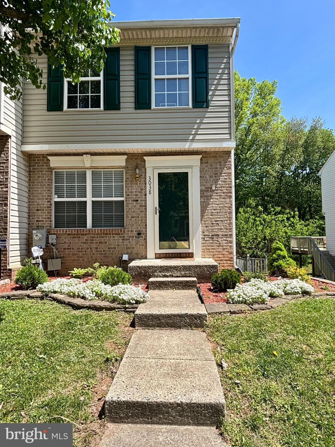 Well-maintained end-unit colonial townhouse in the desirable St. Clair community. This home includes 2 bedrooms, a full bath upstairs, and another full bath in the finished lower level. The updated kitchen features granite countertops and stainless steel appliances, and the lower level provides additional living space. Enjoy one of the largest yards in the neighborhood, fully fenced and backing to trees, with upper and lower decks ideal for relaxing or entertaining. Conveniently located near shopping, dining, and I-95 for easy commuting.