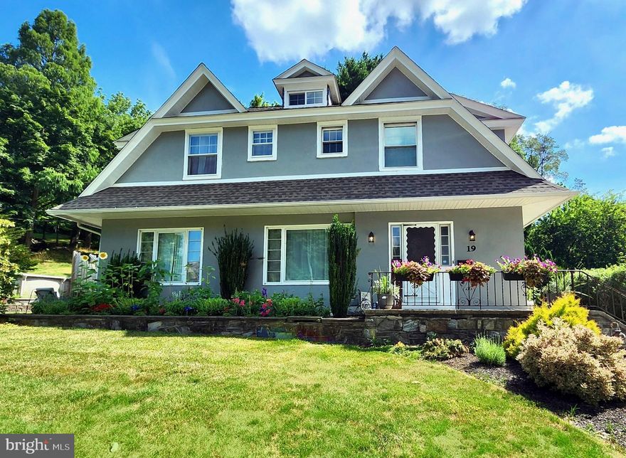 Welcome Home to 19 Wyomissing Hills Blvd, a home rich in history, as it was previously owned by Richard & Catherine Caron (founder of Caron Foundation). This fantastic property offers approximately 2,400 square feet of living space with five bedrooms and three bathrooms.  It has a spacious, clean, and tastefully designed interior with neutral decor and fresh paint throughout. Natural light floods the home through its big windows, and the refinished white oak hardwood floors add warmth and character. A wood-burning fireplace with a new mosaic tile hearth creates a cozy ambiance, while the stainless steel kitchen appliances, newer washer and dryer, and efficient gas heat provide modern conveniences. You'll also find a versatile office space on the first floor which could be converted to an additional bedroom if needed. Brand new carpet on the second floor with sizeable bedrooms as well. If storage space is a must, you'll love the lower level as it offers plenty of shelving and closets for all your needs. The exterior of the home is definitely eye catching with distinct and unique architecture. Situated on a large lot, this property includes a slate paver patio and above-ground pool, providing opportunities for outdoor recreation.  As Spring approaches, the beautiful perennial flowers will bloom and bring life and vibrant color to the property. The quaint neighborhood is a close-knit community that hosts social gatherings and space to run or throw a ball at the nearby park. Enjoy this great location with the best of both a peaceful atmosphere as well as easy access to highways for travel. Don't miss your chance to make this house your new HOME!