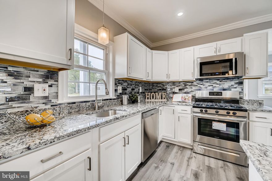 Gorgeous Updated Property! This home is Move-In Ready. The main level features an open floor plan with a gorgeous floors throughout. The gourmet kitchen offers stainless steel gas appliances, granite counter tops, and a large center island. Also on the main level is the powder room, laundry room, dining room and access to your backyard. On the upper level, a beautiful Master Bedroom with an en-suite. Two additional bedrooms, a full bath and a beautiful Juliet Balcony complete this level.  The basement is equipped with a sump pump, extra storage and has been waterproofed for your peace of mind.  Updates include: brand new roof, brand new windows throughout, all new flooring/carpet, updated electrical , brand new furnace and a freshly laid asphalt driveway.  Big backyard, great for entertaining with an enormous shed.  Make us an offer!