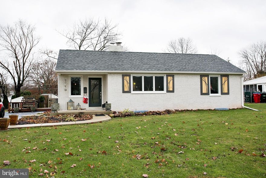 Immaculate and Awesome...just 2 words that describe this impeccably appointed Ranch home.  Picture yourself curled up in front of the Living Room Fireplace or in the Lower level Family Room in front of that fireplace with some hot cocoa and a snack.  It is just a few steps away from the outstanding gourmet kitchen with stainless steel appliances, JennAir Downdraft range for the cook and Bosch Dishwasher for easy clean-up.  No matter what the season, you can enjoy the  huge  16 x 20 addition surrounded with windows and  the luxury of a heated floor.  The view of the spacious lot is breathtaking.  This home has  new Vinwinco windows, custom darkening shades throughout and Therma-tru exterior doors.  Hardwood floors and an incredible newly renovated expanded Bathroom with soaking tub and Shower. Also Washer and Dryer are on main floor for easy access. The expanded Master Bedroom is inviting  with custom closet doors here and throughout the home.  There are 4 remote controlled ceiling fans.  Outdoors you may enjoy the Salt water hot tub with Pergola, Weber gas grill with direct gas(propane) line and deck. There is also a gas line for a future fire pit if desired. Many upgrades have been made including roof, gutters, front walk and patio, heater and hot water heater, electrical panel, sump pump and central air.  This lovely home in a fabulous location will not last.