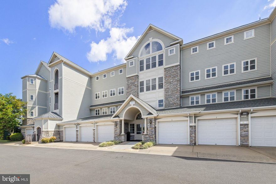 Spacious 2-Bed/2-Bath Condo in Potomac Pointe - Prime Location & Stunning Views
Nestled on the 2nd floor of the highly sought-after Potomac Pointe gated community, this charming 2-bedroom, 2-bathroom condo offers a blend of comfort, convenience, and scenic beauty. Step into the spacious living room featuring a cozy gas fireplace and ceiling fan, creating the perfect ambiance for relaxation. The bonus sunroom provides breathtaking views of lush trees, the VRE Station, and the Featherstone National Wildlife Refuge, allowing you to unwind while enjoying nature’s beauty.
The kitchen is a chef's dream, with granite countertops, cherry cabinets, and gas cooking for ultimate convenience. The adjacent dining room offers a great space for entertaining. Gas heat and hot water ensure efficiency year-round.
Retreat to the expansive primary bedroom suite, complete with a ceiling fan, private balcony access, a large walk-in closet, and a luxurious en-suite bathroom featuring a soaking tub, separate shower, and double vanity. The second bedroom is generously sized and adjacent to the guest bathroom.
This condo is thoughtfully designed with sisal carpeting and ceramic tile throughout, along with a laundry closet equipped with a full-size washer and dryer for added convenience. Additional storage is available in a large private storage space just off the elevator.
Enjoy access to a wide range of amenities within this secure, gated community, including a clubhouse, pool, tot lot, fitness center, business center, and more. The property also features a 2-car EV charging station, with one assigned parking spot.
Conveniently located within walking distance of the Rippon VRE Station, this home is just 2.5 miles from the Potomac Town Center (featuring Wegmans, the Apple Store, and premium dining), and offers easy access to I-95. Additionally, you'll be close to Potomac Mills, Sentara Hospital, and a variety of local attractions.